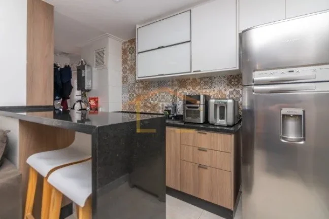 Imagem Apartamento com 65m², 2 dormitórios, sendo 1 suite, sala para dois ambientes, varanda gourmet com ...