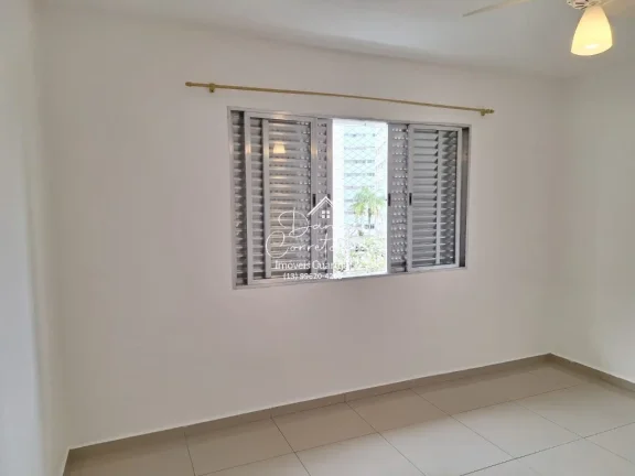 Imagem Imperdível oportunidade, apartamento de 2 quartos sem mobília na rua mais desejada do Guarujá-SP - 65m² - 1 vaga de garagem