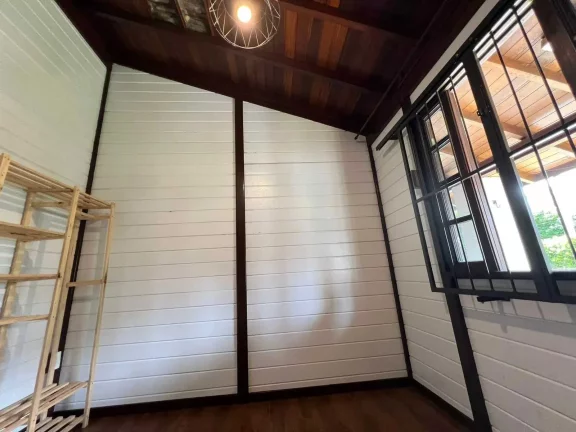 Imagem Casa com 3 dormitórios sendo 1 suíte e 1 vaga de garagem no Bairro Cabeçudas em Itajaí/SC