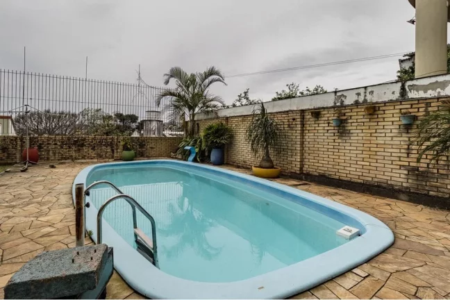 Imagem Casa com 3 Quartos à Venda, 464 m² em Santo Antônio - Porto Alegre