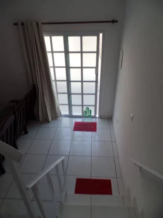 Imagem Sobrado com 2 dormitórios à venda, 77 m² por R$ 320.000,00 - Balneário Itaguaí - Mongaguá/SP