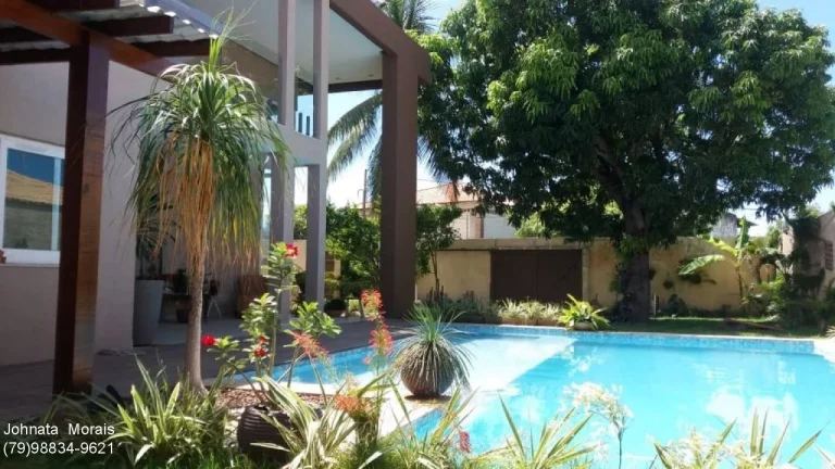 Imagem Casa à venda no Bairro Aruana - 4 suítes, piscina e área gourmet | Contato: (79) 98834-9621