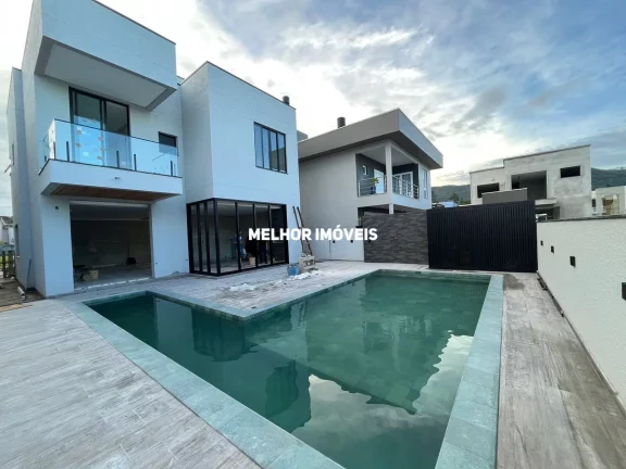 Imagem Casa nova Alto Padrão á venda com 3 suítes e 2 vagas localizada em Camboriú