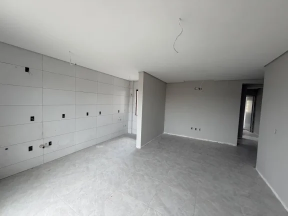 Imagem Apartamento de dois dormitórios, sendo uma suíte, sacada com churrasqueira e uma vaga de garagem no bairro de Gravatá, em Navegantes - Adriano Carpes imóveis vende