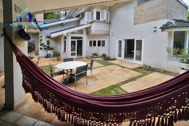 Imagem CASA 4 SUÍTES, PISCINA, 10 VAGAS, 666m² CONSTRUÍDA. TERRENO 1.194m².