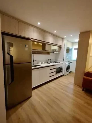 Imagem Apartamento vista mar mobiliado com 2 dormitórios sendo 1 suíte e 1 vaga de garagem na Brava