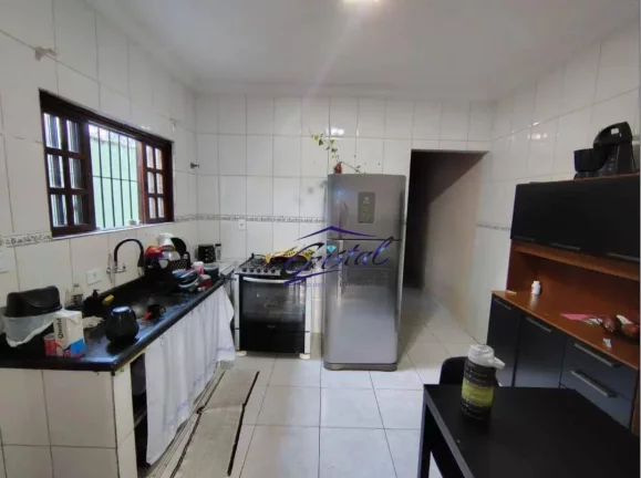 Imagem Casa com 2 dormitórios à venda, 72 m² por R$ 355.000 - Maracanã - Praia Grande/SP