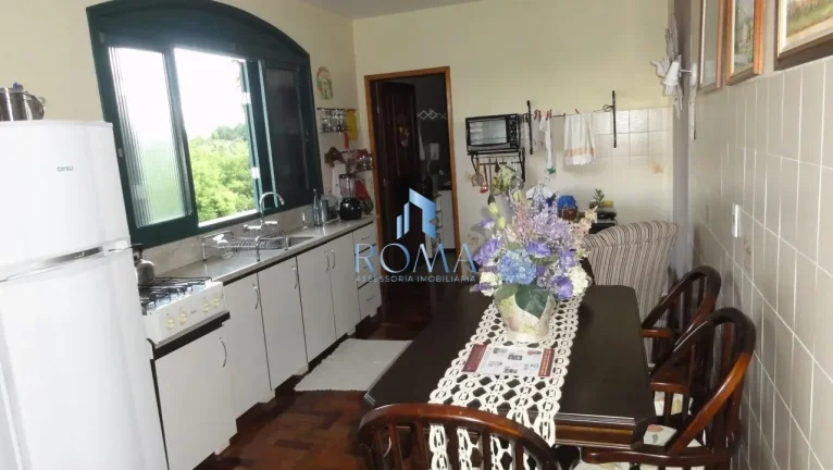 Imagem Casa 5 dormitórios à venda Diácono João Luiz Pozzobon Santa Maria/RS