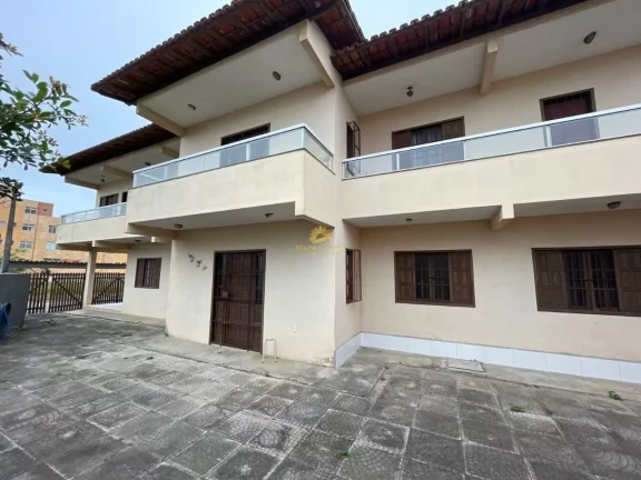 Imagem Encantadora casa duplex em Meaípe, Guarapari, ES! 4 quartos, sendo 1 suíte, 2 vagas de garagem. Lo...