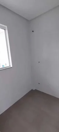 Imagem Casa com 2 Dormitórios sendo 1 suíte e 1 vaga na Garagem em Navegantes.