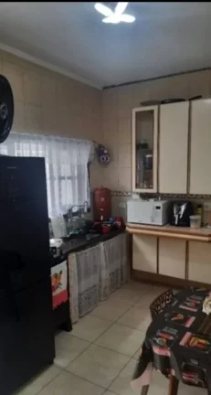 Imagem Casa com 4 dormitórios à venda PROXIMO A PRAIA DIVISA COM TUPI E OCEAN 94 m² por R$ 410.000 - Vila Assunção - Praia Grande/SP