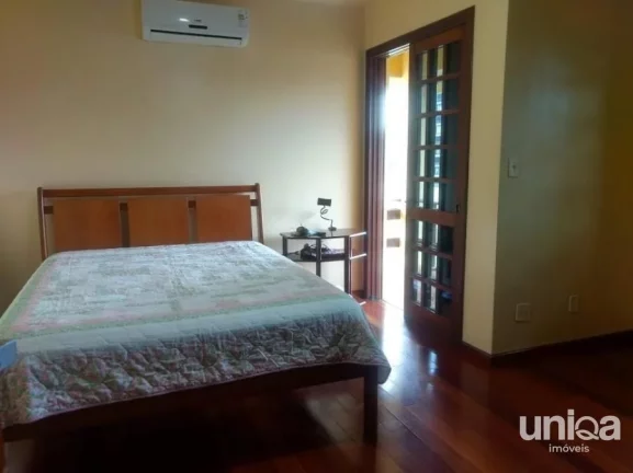 Imagem Casa 4 dormitórios (2 suítes), banheira de hidro, piscina, garagem