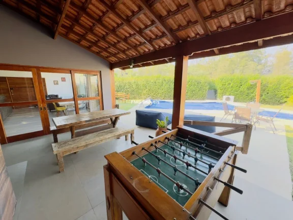 Imagem Oportunidade única: Casa de condomínio de alto padrão com 3 suítes e 4 vagas no Ninho Verde I, Porangaba-SP!