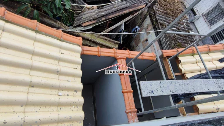 Imagem Casa com 2 dormitórios à venda, 60 m² por R$ 350.000 - Tude Bastos - Praia Grande/SP