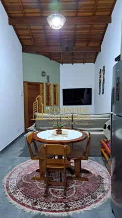 Imagem Casa Elegante com 4 Dormitórios a 700 metros da praia de Massaguaçu.