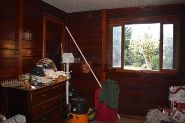 Imagem Casa com 3 dormitórios à venda, 280 m² por R$ 1.220.000 - Alto Do Capivari - Campos do Jordão/SP