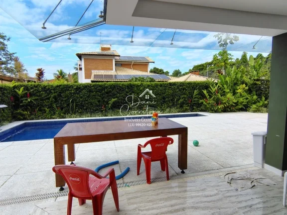 Imagem Casa de luxo em condomínio na Enseada, Guarujá-SP: 5 quartos, 5 suítes, 2 salas, 4 vagas e 390m² de área. Imperdível!