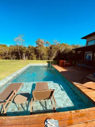 Imagem Luxuosa casa em condomínio à venda em Praia do Forte - Mata de São João-BA: 5 quartos, 5 suítes, 3 salas, 3 banheiros, 3 vagas, 400m².