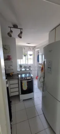 Imagem Imperdível apartamento à venda em Macaé-RJ, Riviera Fluminense! 2 quartos, 1 suíte, 2 salas, 3 banheiros, 2 vagas de garagem. Confira!