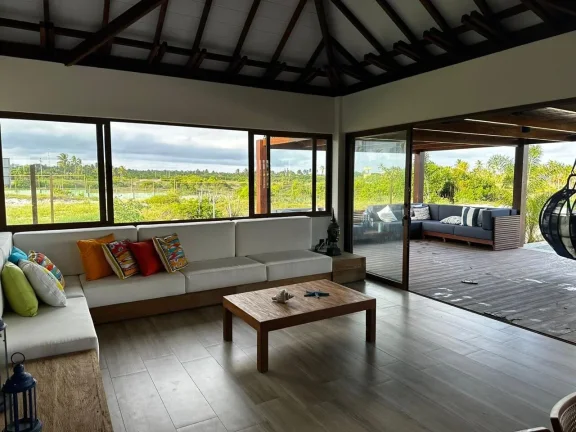 Imagem Casa em Condomínio à venda em Imbassaí, Mata de São João - Condomínio fechado com vista para o mar