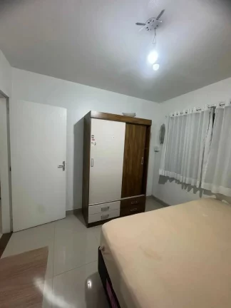Imagem Apartamento com 2 dormitórios sendo 1 suíte e 1 vaga de garagem em Itapema/SC