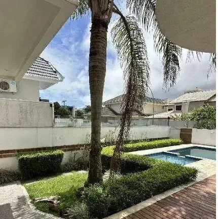 Imagem Casa de Alto Padrão em Jurerê Internacional a Poucos Minutos da Praia