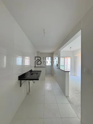 Imagem Apartamento de 2 dormitórios sendo 1 suíte, prédio frente mar no bairro Vila Mirim - Praia Grande