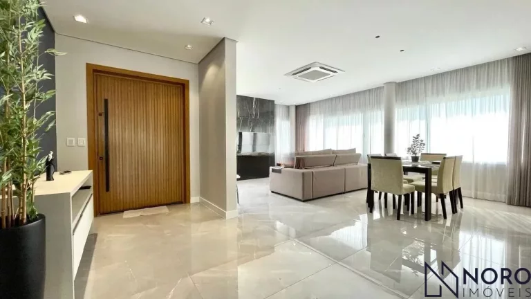 Imagem Casa de Alto Padrão no Condomínio Real Park – 3 Suítes, Vista Panorâmica e Espaç