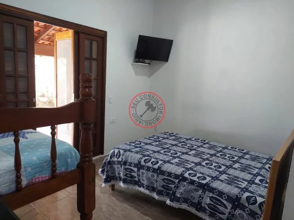 Imagem CASA Terrea escritura definitiva com varanda ,2 suites, lavabo, area gourmet,piscina , garagem para 5 carros e duas kitnets