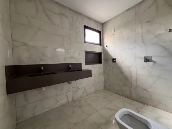 Imagem Casa Alto Padrão à Venda no Alto dos Caiçaras – 3 Suítes, Piscina e Área Gourmet em Patos de Minas