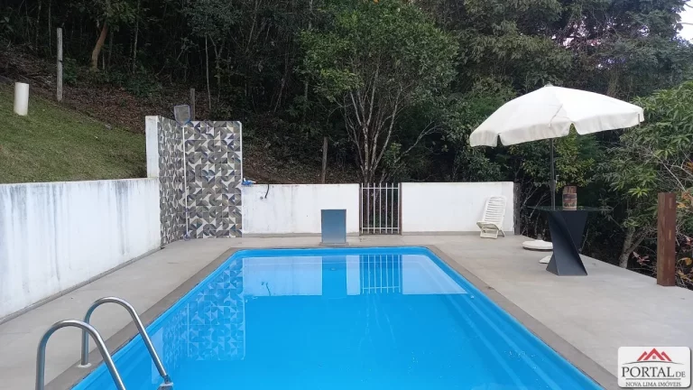 Imagem Esta linda casa a venda está localizada no Condomínio Vila do Ouro, em Nova Lima,