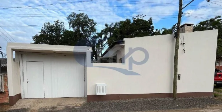 Imagem Casa á venda com 2 dormitórios na Vila São João em Torres/RS