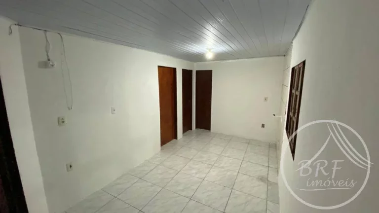 Imagem Vendo terreno com três casas e uma Kitnet em Serraria, São José SC