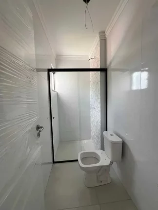 Imagem Geminado com 3 dormitórios sendo 1 suíte, sacada com churrasqueira e 1 vaga em Barra Velha