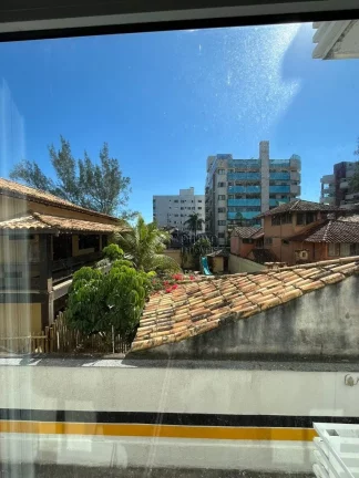 Imagem Imóvel à venda na Praia do Pecado, Macaé-RJ: Apartamento de 3 quartos com suíte, sala ampla e 2 vagas de garagem