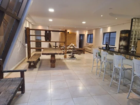 Imagem Imperdível oportunidade de adquirir esta linda casa com 5 suítes a 100m da praia no Jardim Virgínia, Guarujá-SP!