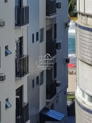 Imagem Apartamento com locação sem garantia frente mar Tombo com lazer: 2 salas, 2 banheiros, 1 vaga de garagem, 78m².