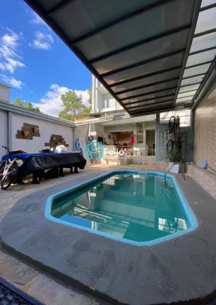 Imagem Casa 5 dormitórios com 2 suítes, com piscina, churrasqueira no bairro Partenon/Jardim Botânico