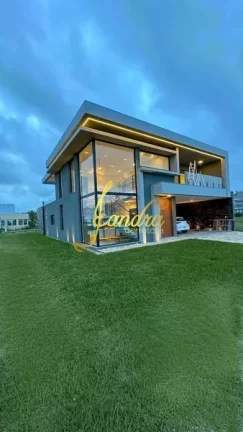 Imagem Sobrado Costa Serena, a beira do lago, condomínio beira mar com 04 suites mobiliado