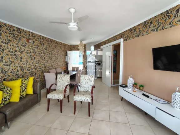 Imagem Apartamento com locação sem garantia frente mar Tombo com lazer: 2 salas, 2 banheiros, 1 vaga de garagem, 78m².