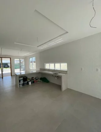 Imagem Terras Alphaville 1 - Casa de 3 suítes com 311m² e 3 vagas de garagem!