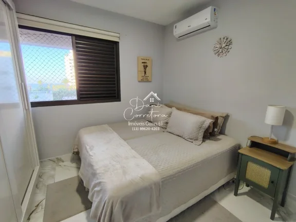 Imagem Imperdível! Apartamento de 2 quartos com suíte e 2 vagas de garagem em Pitangueiras, Guarujá-SP - 78m² de conforto e elegância!