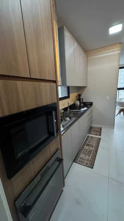 Imagem Apartamento com 3 dormitórios sendo 2 suítes e 2 vagas de garagem em Meia Praia Itapema/SC