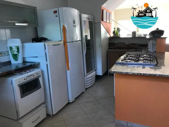 Imagem Venda Casa Juquehy, com 3 dormitórios, sendo 1 suíte, 2 vagas, 850m da praia, escritura de posse | Juquehy Imobiliária.