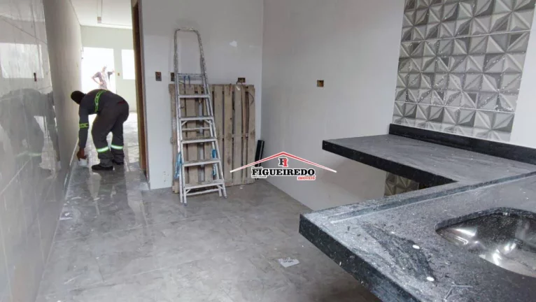 Imagem Casa com 2 dormitórios à venda, 60 m² por R$ 350.000 - Tude Bastos - Praia Grande/SP