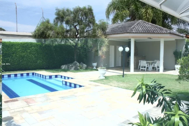Imagem Espetacular casa em condomínio à venda em Alphaville Residencial Dois, Barueri-SP: 4 quartos, 4 suítes, 5 banheiros, 4 vagas, 400m²!