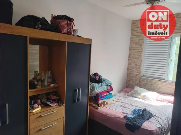 Imagem Apartamento com 2 dormitórios à venda, 64 m² por R$ 220.000,00 - Saboó - Santos/SP