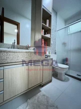 Imagem 04 Quartos sendo 02 suítes e 3 vagas de garagem Prédio Frente Mar