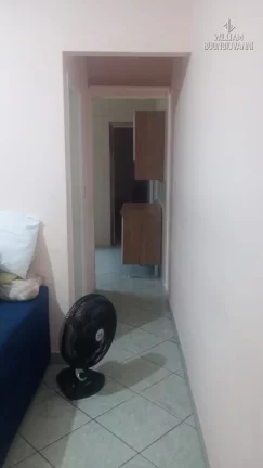 Imagem Casa em Praia Grande, na Vila Tupi, 2 dormitórios e área construída de 93,7 m².