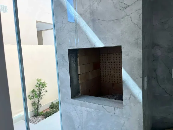 Imagem Casa com 3 dormitórios sendo 1 suíte e 1 vaga de garagem em Gov Celso Ramos/SC